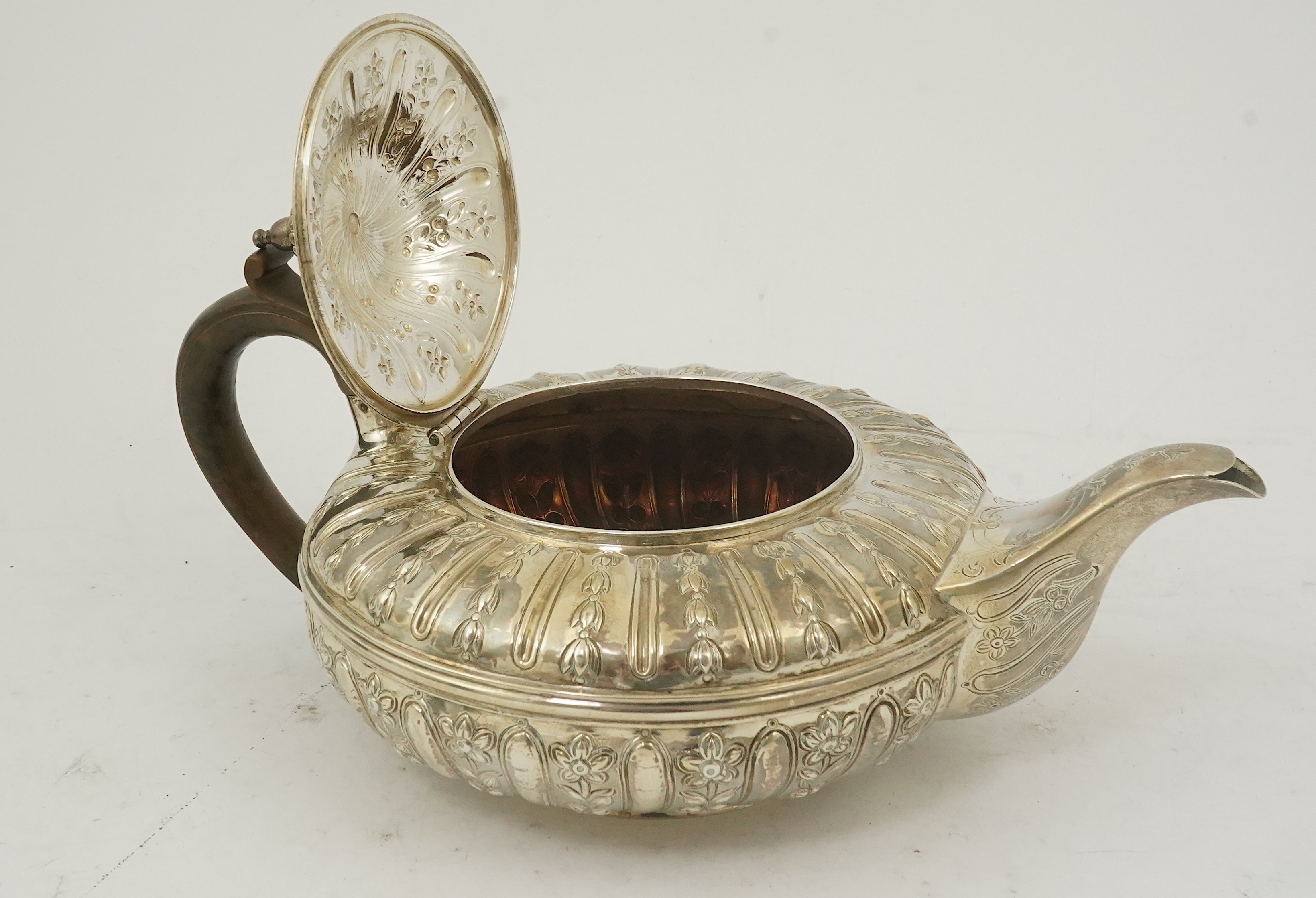 A William IV embossed silver teapot, by Joseph & John Angell